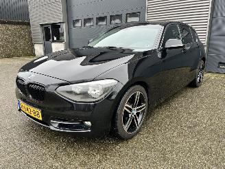 occasion passenger cars BMW 1-serie 118i AUTOMAAT / CLIMA / NAVI / CRUISE / PDC 2011/12